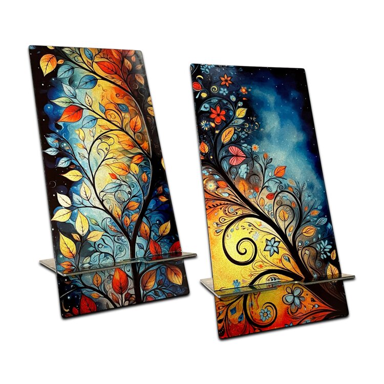A double-sided stainless steel smartphone stand featuring the Flowers Garden blue forest design in a metallic finish. The reversible artwork lets you display either side, while the cable recess makes it practical for charging while your phone is on the stand. Handmade in London. by Urband London