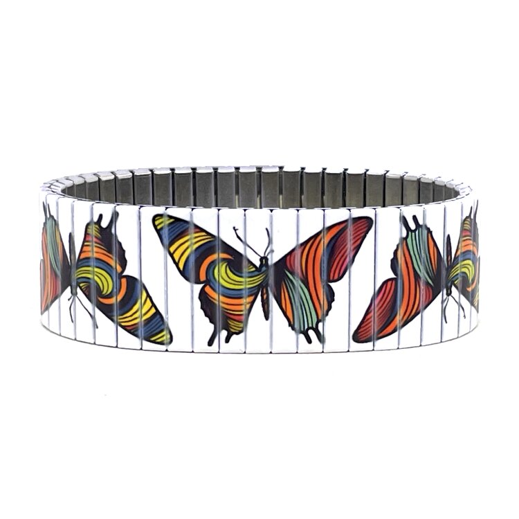A bold 22mm stainless steel stretch bracelet featuring the Art magical butterflies design in a polished finish. The wide profile gives the artwork maximum impact, while the clasp-free construction makes it easy and comfortable to wear. Waterproof, scratch-resistant and nickel-free, each bracelet is handmade in London and presented in a gift box. by Urband London