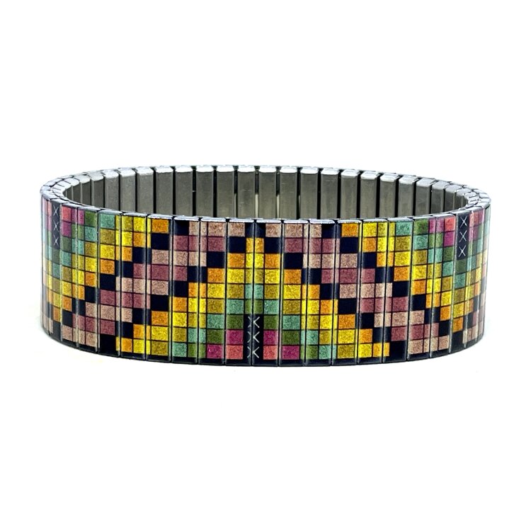 A bold 22mm stainless steel stretch bracelet featuring the Soho zigzag pixels design in a metallic finish. The wide profile gives the artwork maximum impact, while the clasp-free construction makes it easy and comfortable to wear. Waterproof, scratch-resistant and nickel-free, each bracelet is handmade in London and presented in a gift box. by Urband London