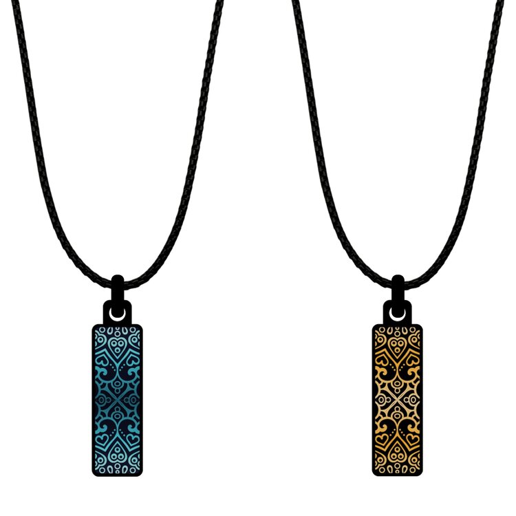 A double-sided 8mm x 24mm rectangular stainless steel pendant featuring the Mandala Daisies granda design in a metallic finish. Its slim shape and two-sided artwork give it a contemporary, easy-to-wear character.  by Urband London
