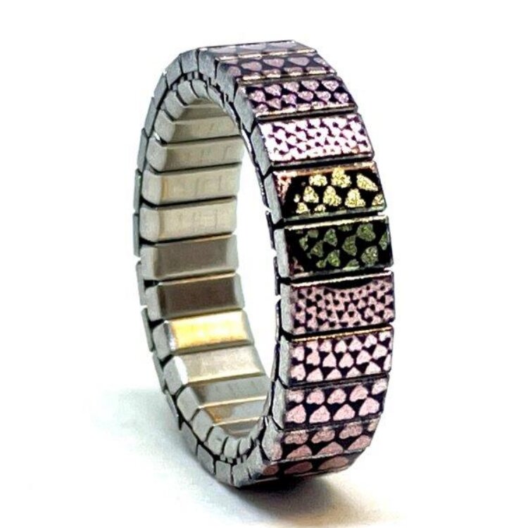 A 6mm stainless steel ring featuring the With Love rose gold infinity design in a metallic finish. The slim band gives the artwork a clean, contemporary look that is easy to wear every day. by Urband London