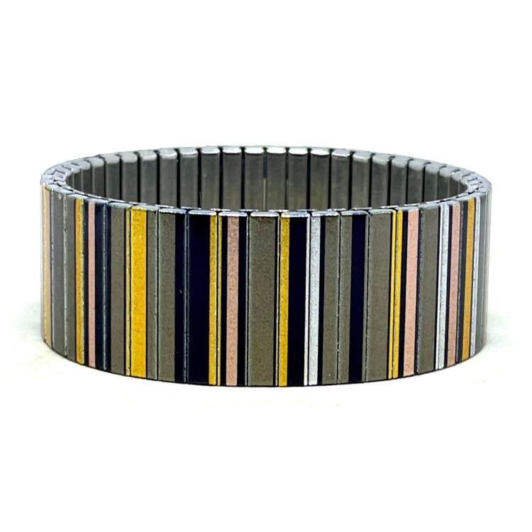 A bold 22mm stainless steel stretch bracelet featuring the Lines Art golden beads design in a metallic finish. The wide profile gives the artwork maximum impact, while the clasp-free construction makes it easy and comfortable to wear. by Urband London