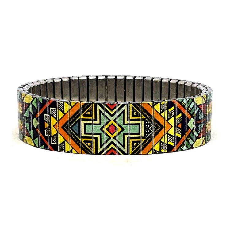A statement 18mm stainless steel stretch bracelet featuring the Yellowstone Cheyenne Ambience design in a metallic finish. The wider profile gives the artwork extra impact, while the clasp-free construction makes it easy and comfortable to wear. by Urband London