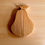 Thumbnail: Small Pear Oak Trivet laying flat on counter