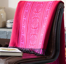 Julia Brendel Hungarica Throw Fuchsia on the chair.jpg