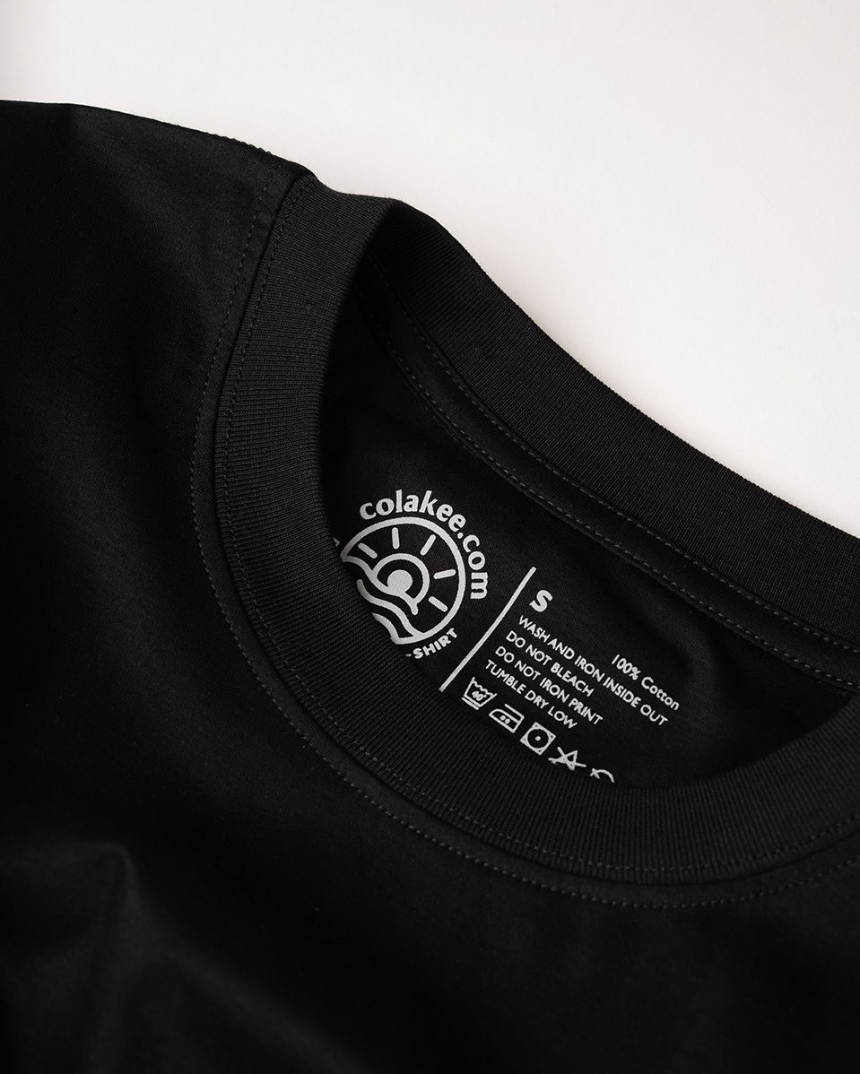 Thumbnail: Close-up of colakee inner neck label showing 100% natural cotton material and premium quality