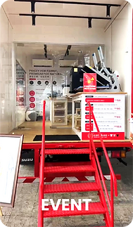 The entrance of the Colakee red mobile creative factory set up for an on-site event printing collaboration.