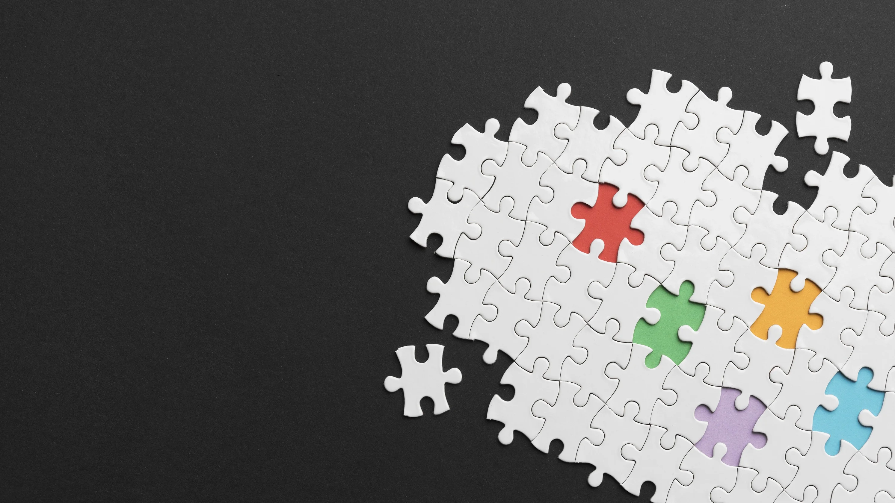 different-pieces-of-puzzle-arrangement-with-copy-space.webp