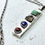 Thumbnail: Hollow rectangular necklace with ruby