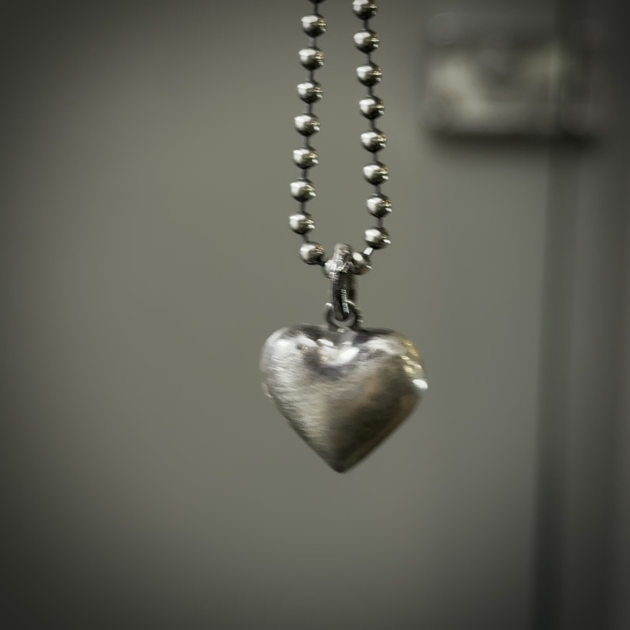 Silver hollow heart pendant necklace