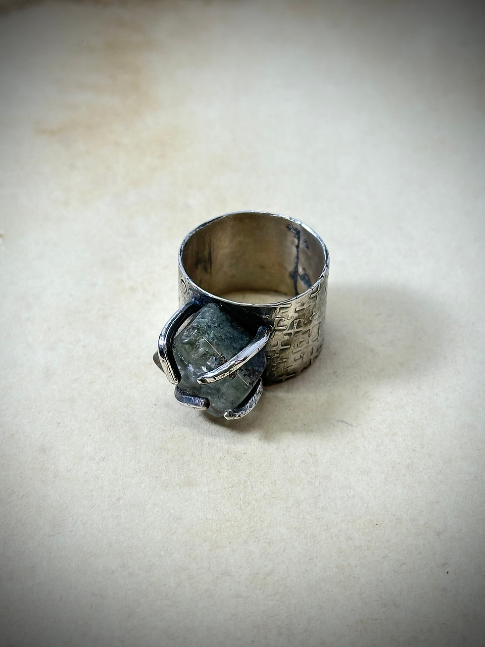 Patterned wide ring band with Green Phantom Quartz