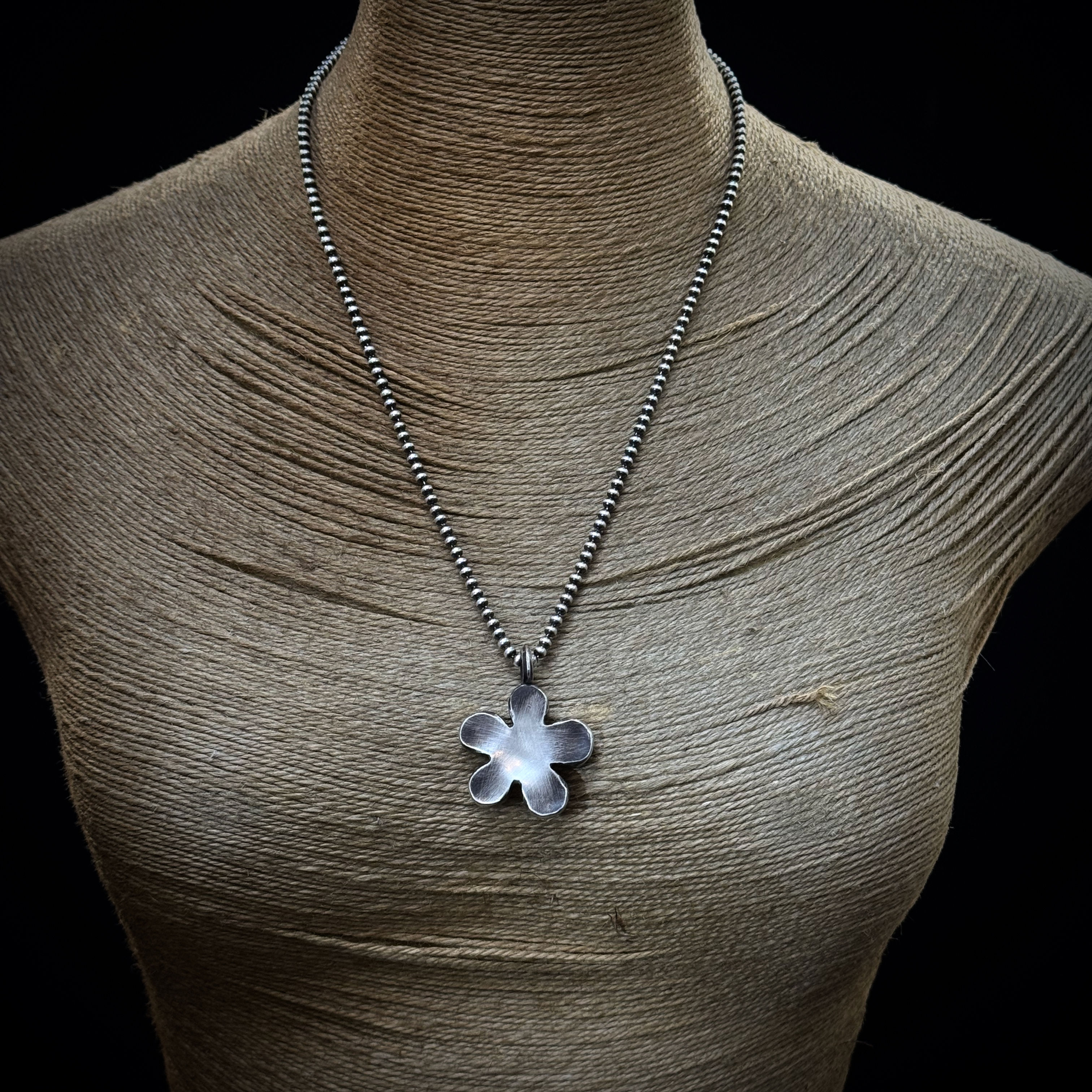 Silver hollow flower pendant necklace
