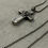 Thumbnail: Hollow cross necklace with tourmaline