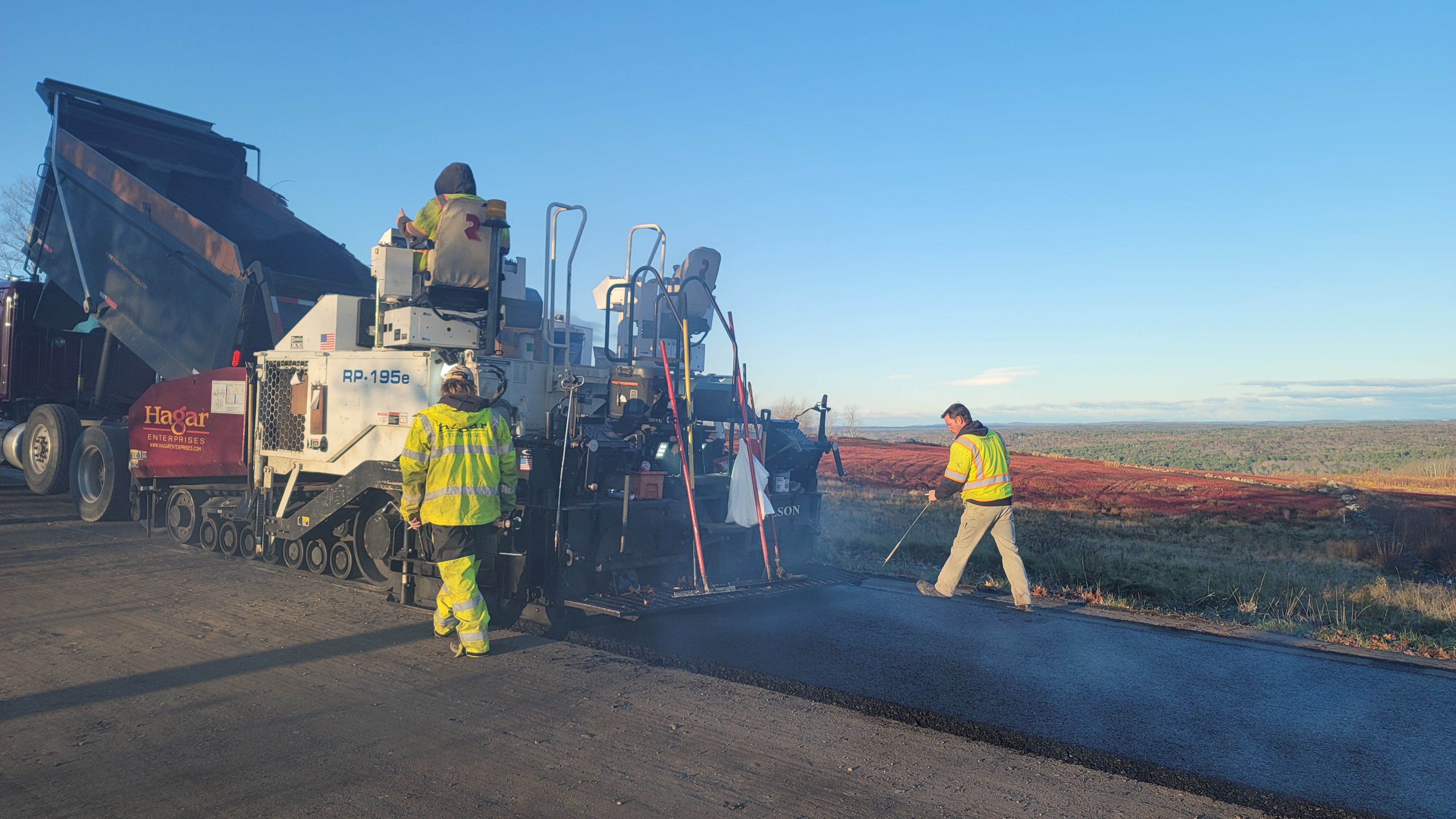 Hagar Enterprises crew paving a road