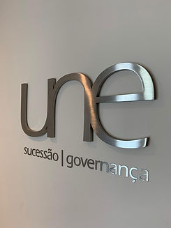 logomarca Une Sucessão e Governança