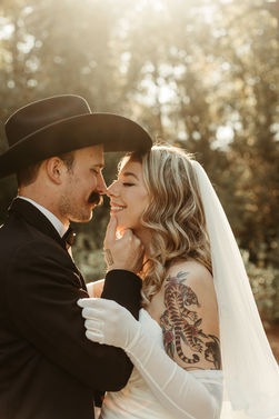 man and woman at sunset