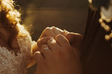 man and woman holding hands