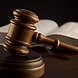 Gavel in front of law book
