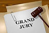 Gavel on top of Grand Jury Paperwork