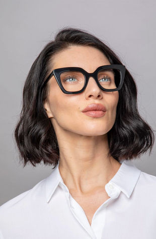 Female model wearing designer optical glasses in eyewear photography by Simon Clemenger