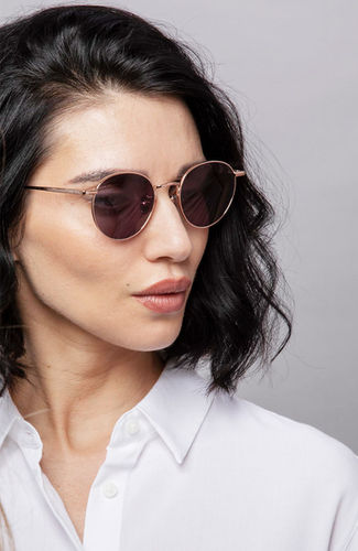 Female model wearing designer optical glasses in eyewear photography by Simon Clemenger