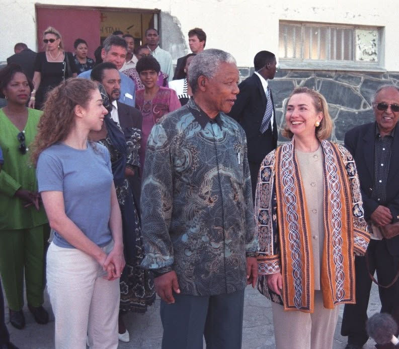 Nelson Mandela takes Hillary and Chelsea Clinton on a tour of Robben Island in 1997.