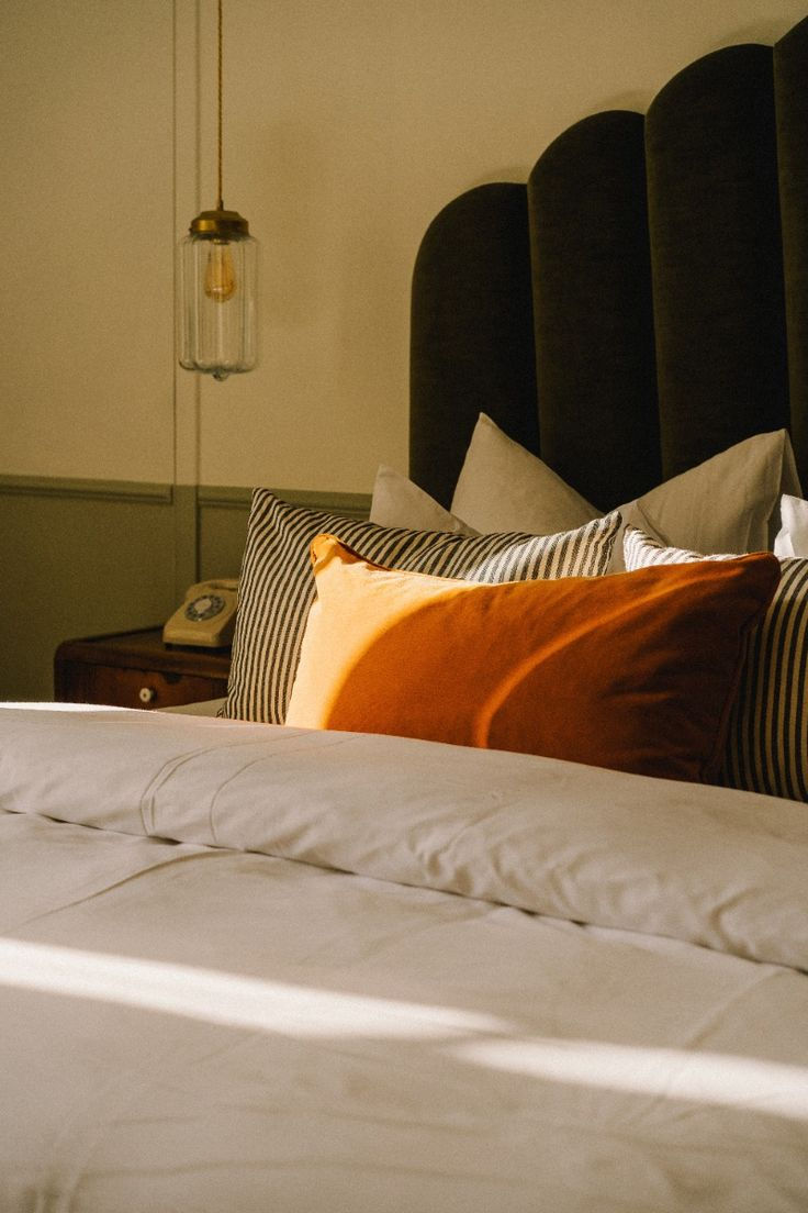 Cozy Boutique Hotel Bed Photography by Natalie Chaban _ Stylish Sleep Spaces.jpg