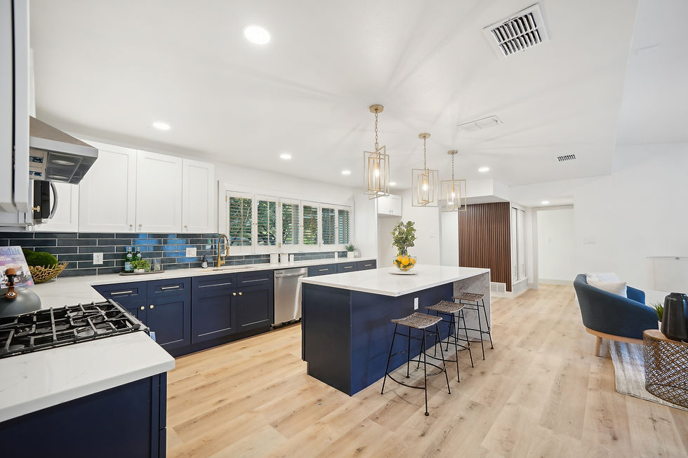 gold fixtures and wood textures in remodeled kitchen
