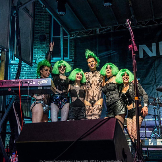 catfight-market-days-green-wigs-group.jpeg