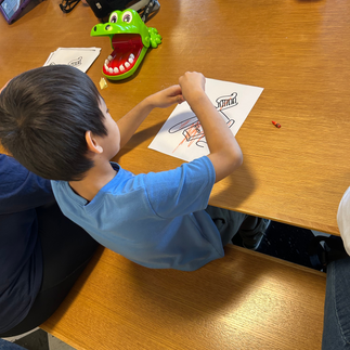 child coloring a toothbrush coloring page