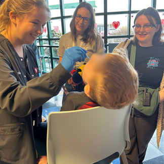 dental students demonstrating dental office processes for an ABA client