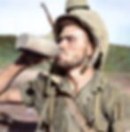 GI drinking from canteen Vietnam era soldier
