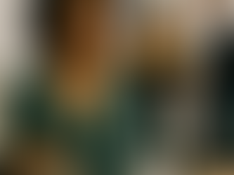 A hopeful African American woman sits in a meeting room, thoughtfully reviewing a notebook labeled “Pros” and “Cons,” with an SRD Leadership Training mug beside her, symbolizing reflection and careful decision-making before leaving a job.