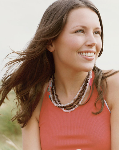 Woman Smiling Outdoors