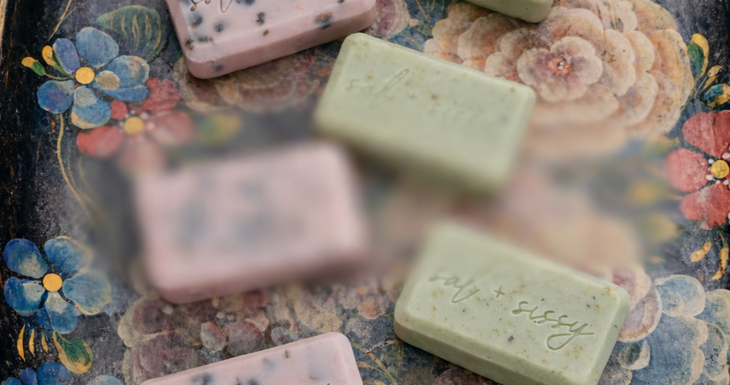 Artisanal soaps on antique tray.png