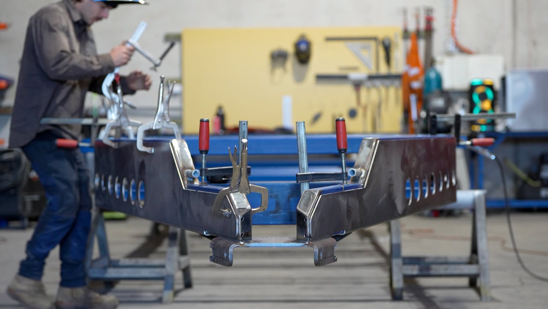 A drawbar clamped in the jig in our fab shed