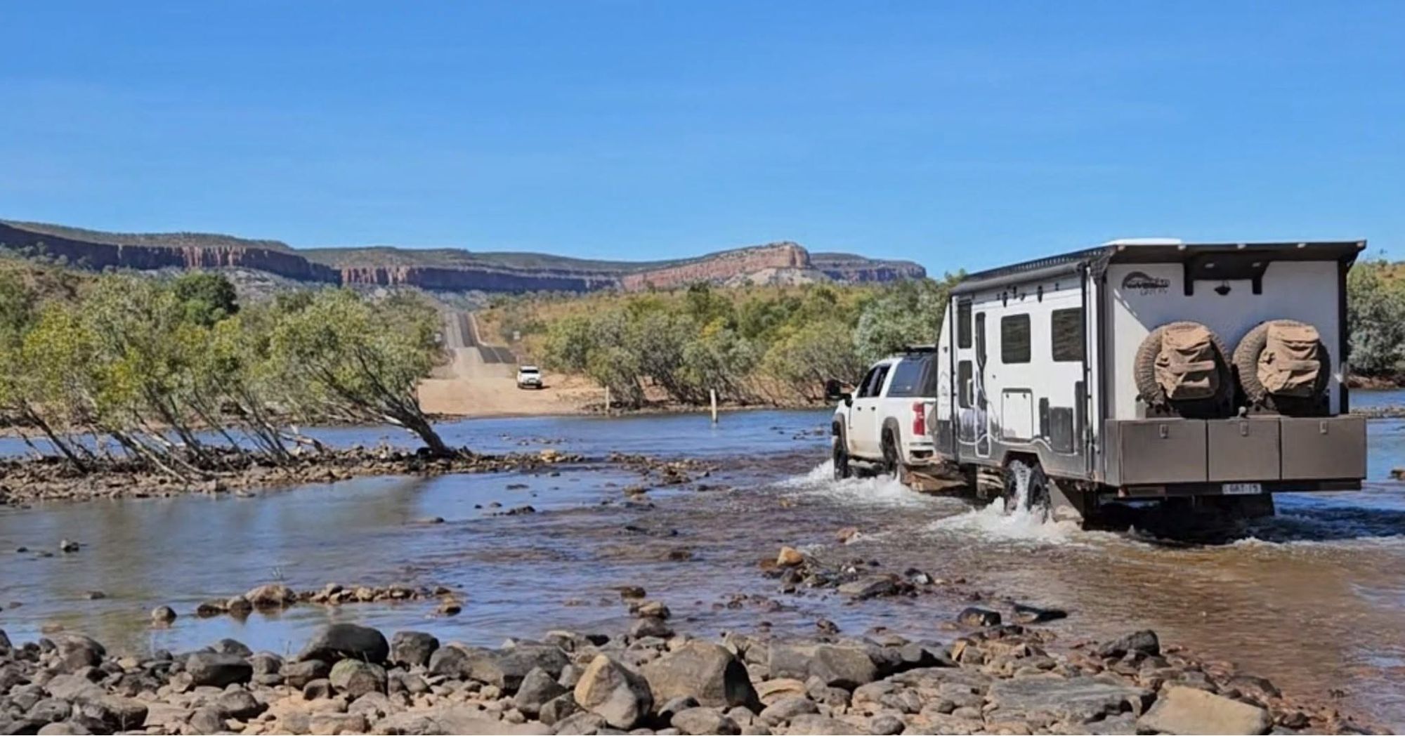 An Offroad Grit RV crossing a river in the Kimberley