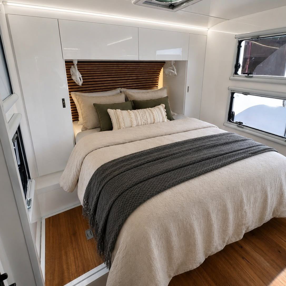 Bedroom with timber bedhead and storage