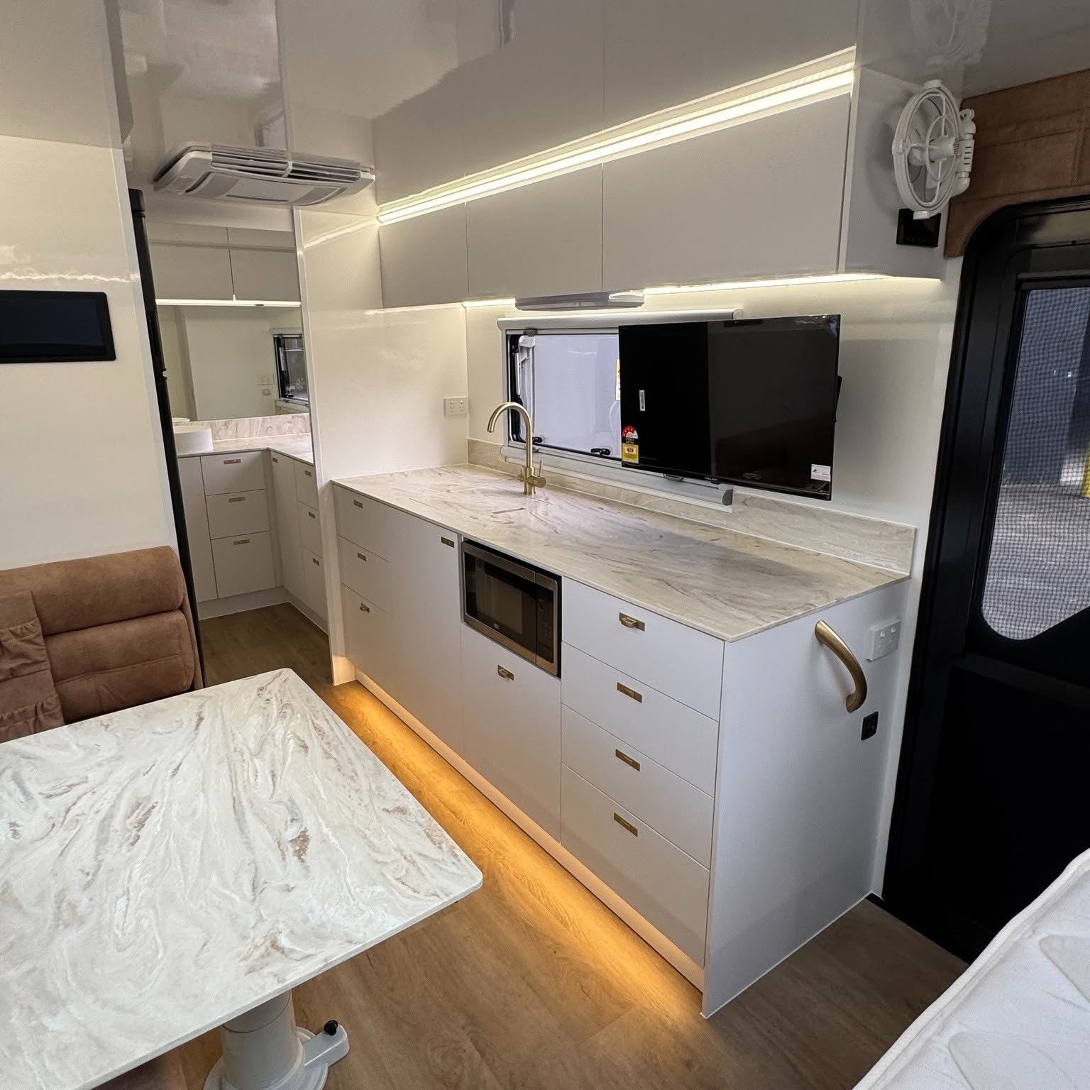 Kitchen with TV and marble table