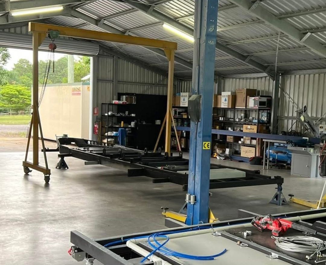 Our first shed in Beerwah in 2022, with a chassis under the gantry