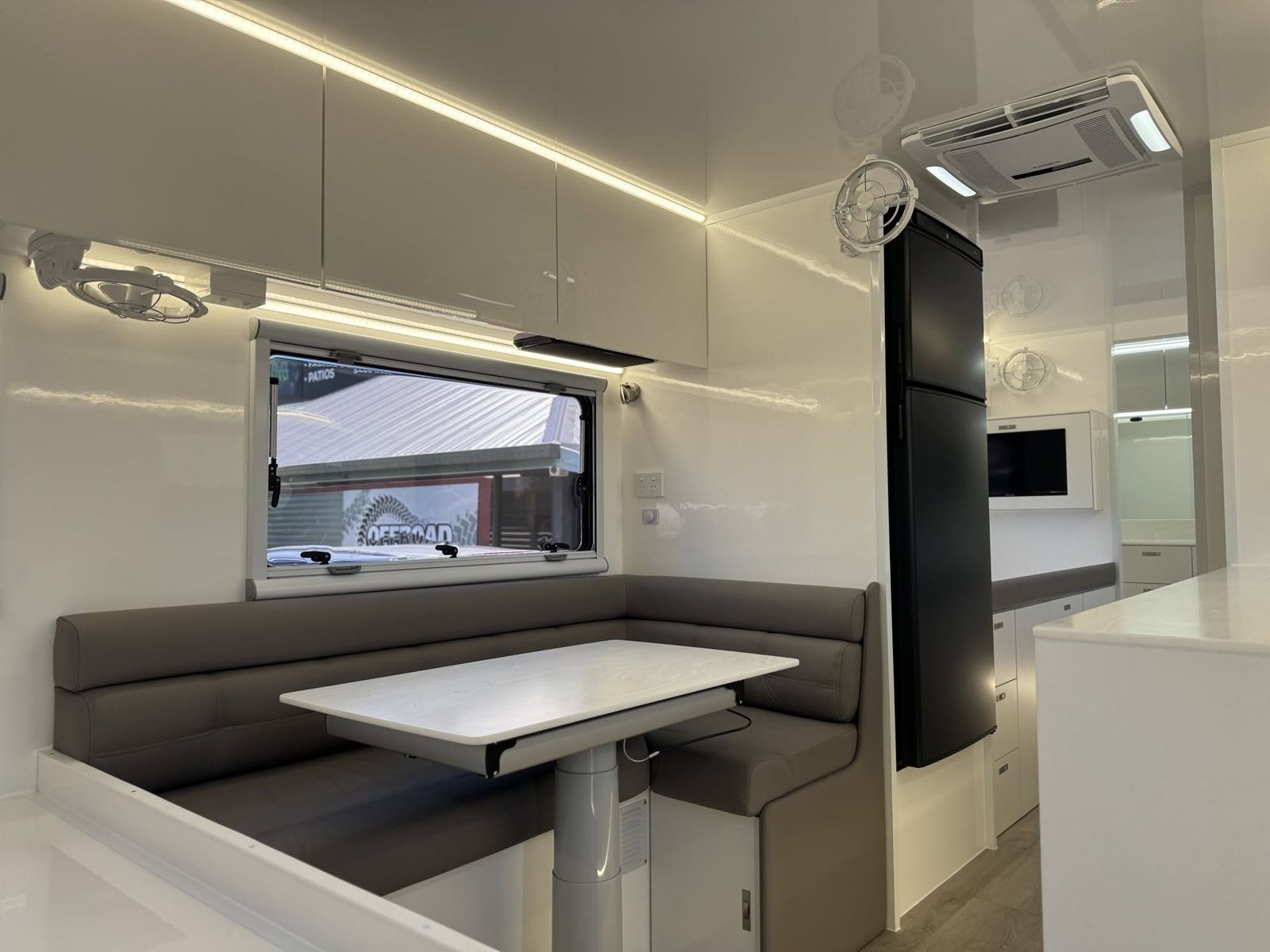 Grey dinette under LED lighting