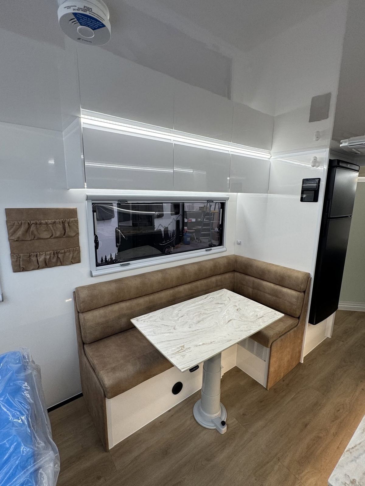 Tan dinette under the window