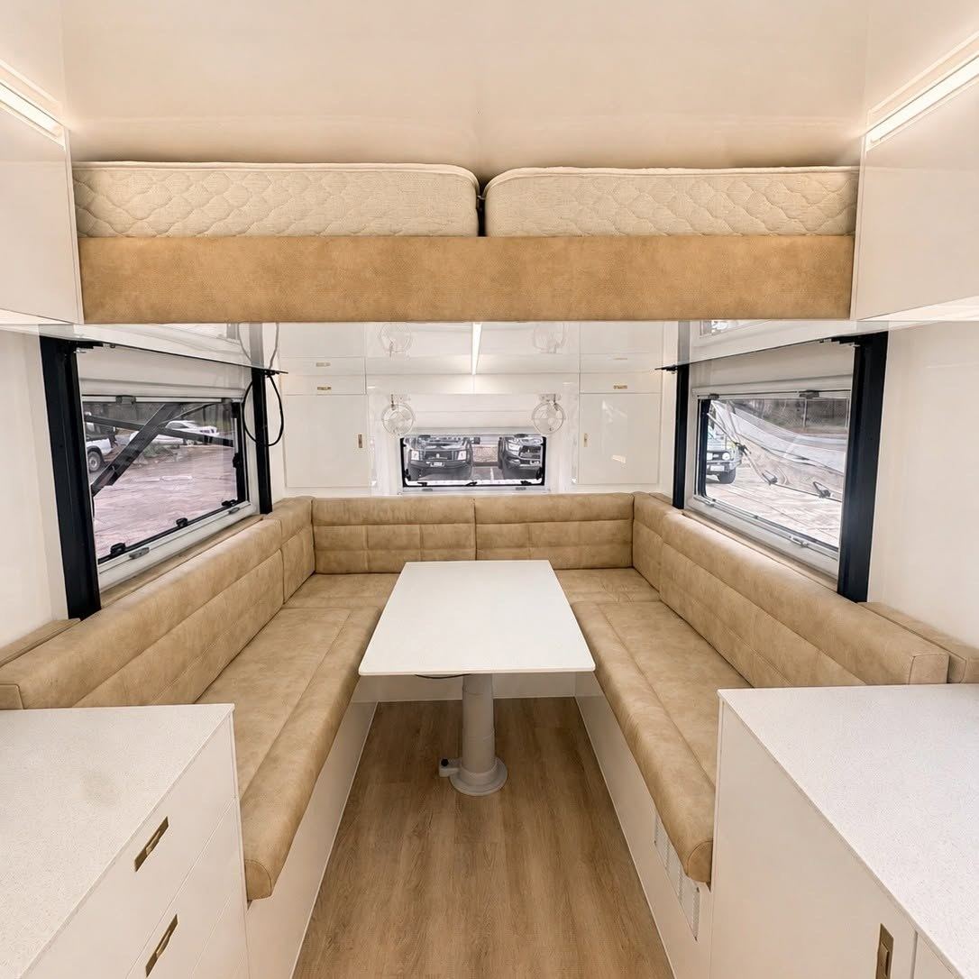 Rear club lounge with overhead bunk