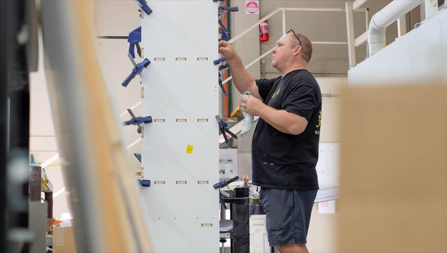 Gluing and clamping a cabinet panel
