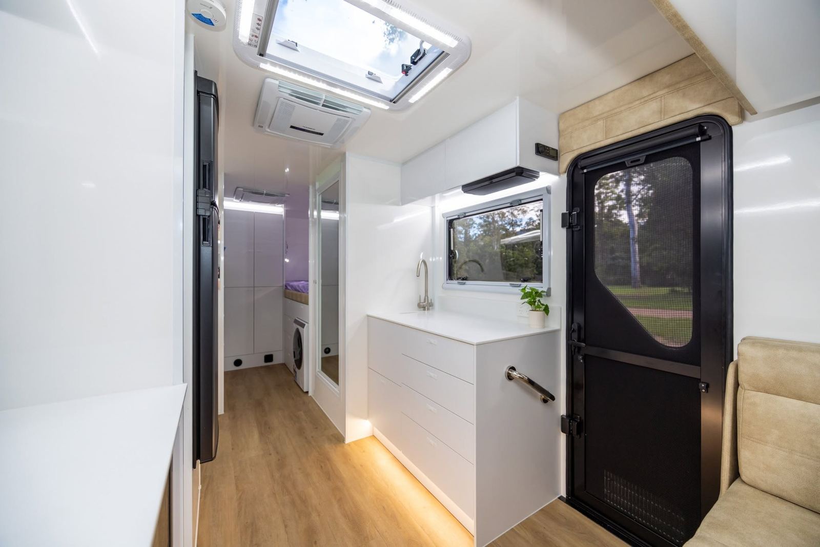 Door, kitchen and ensuite beyond