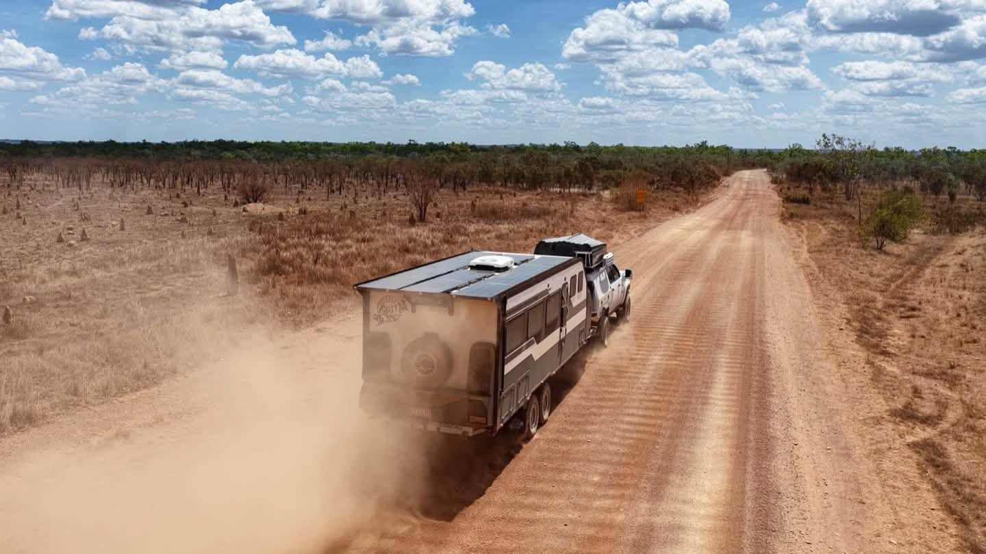 Red dust and a long straight road