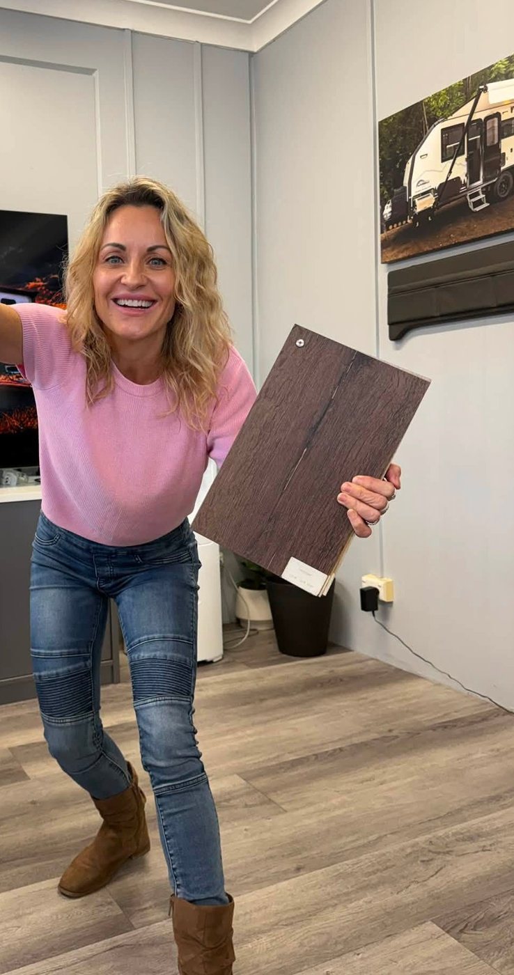 Miriam choosing her flooring in the showroom