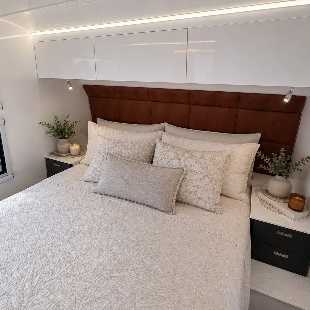 Bedroom with leather bedhead and bedside tables