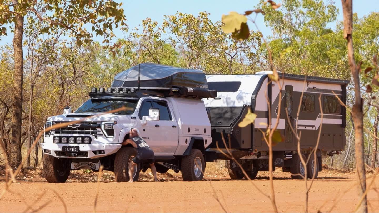 ADU's van and ute set up among the trees