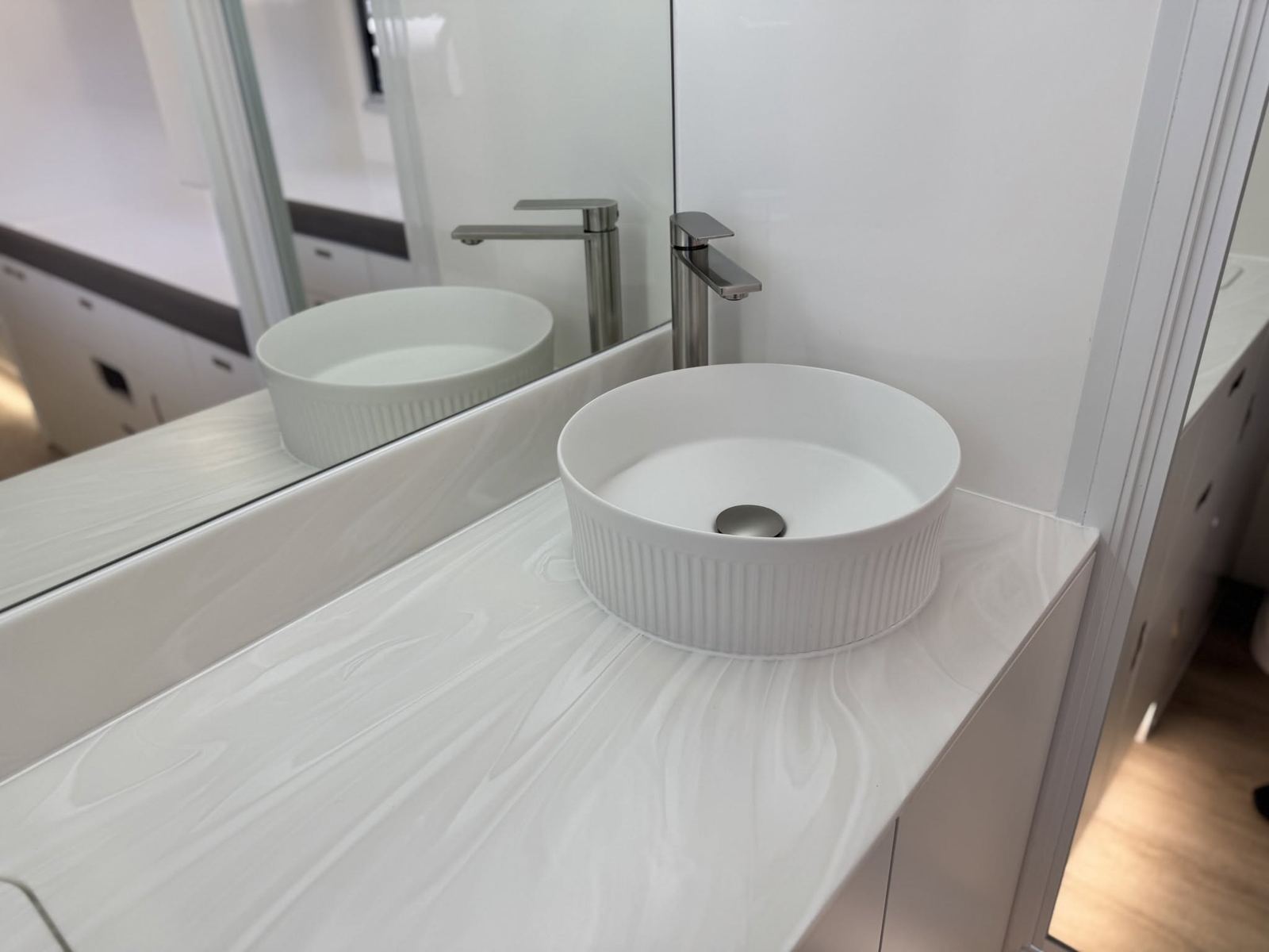 Fluted vessel basin